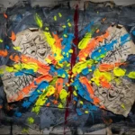 An abstract mixed-media piece showing bright yellow and orange splashes like a laugh, covering a dark, dense gray background.